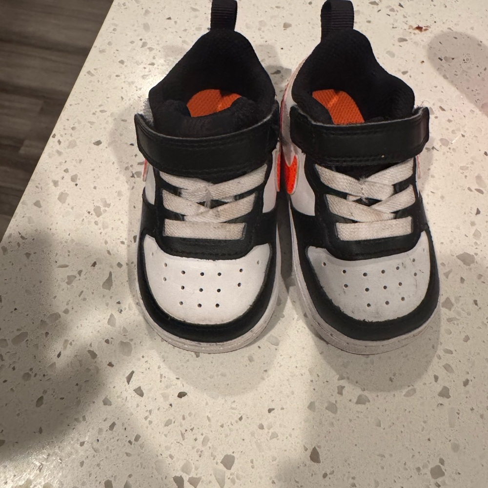 Nike Black and Orange High-Top Sneakers
